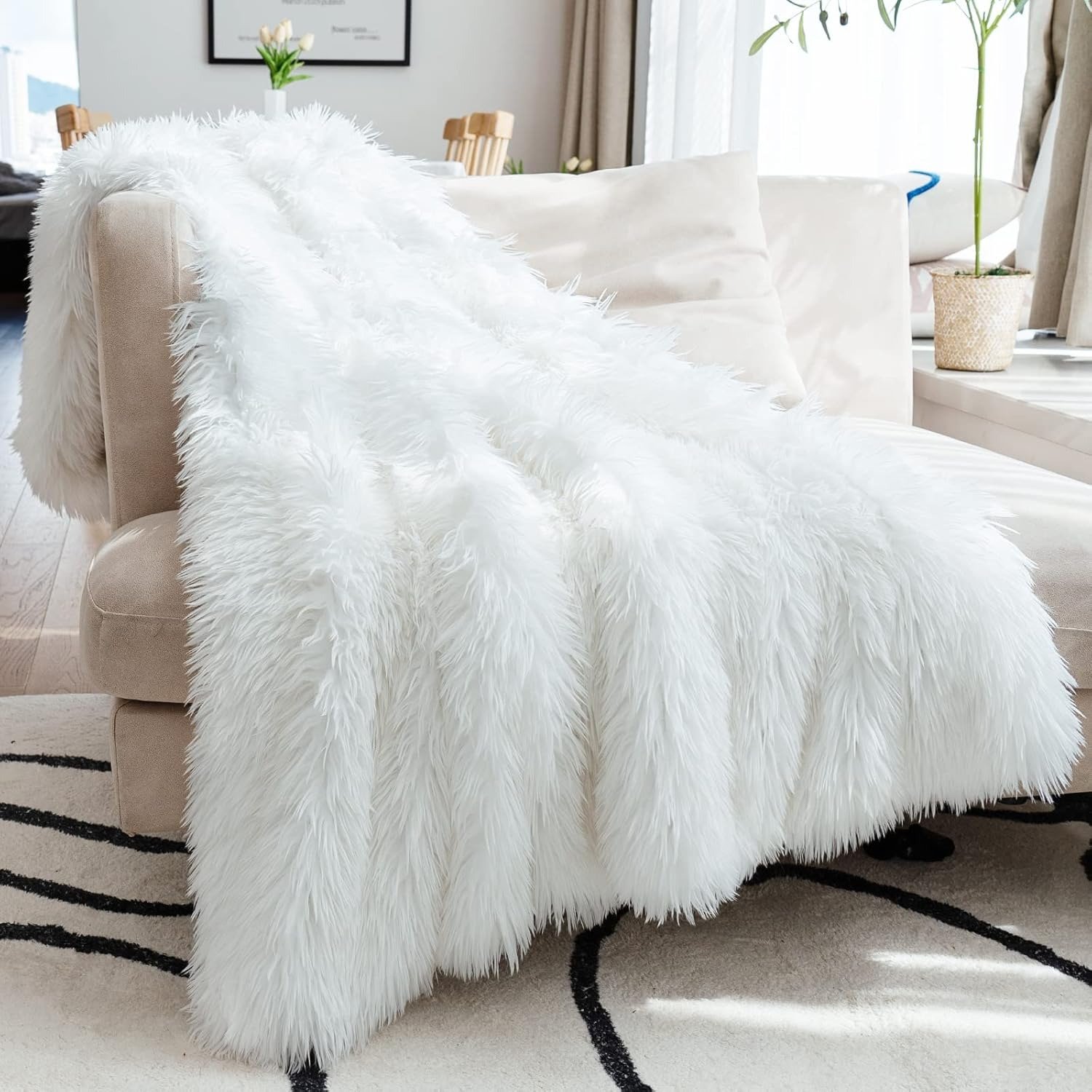 fluffy faux fur throw blanket with pet relaxing on it