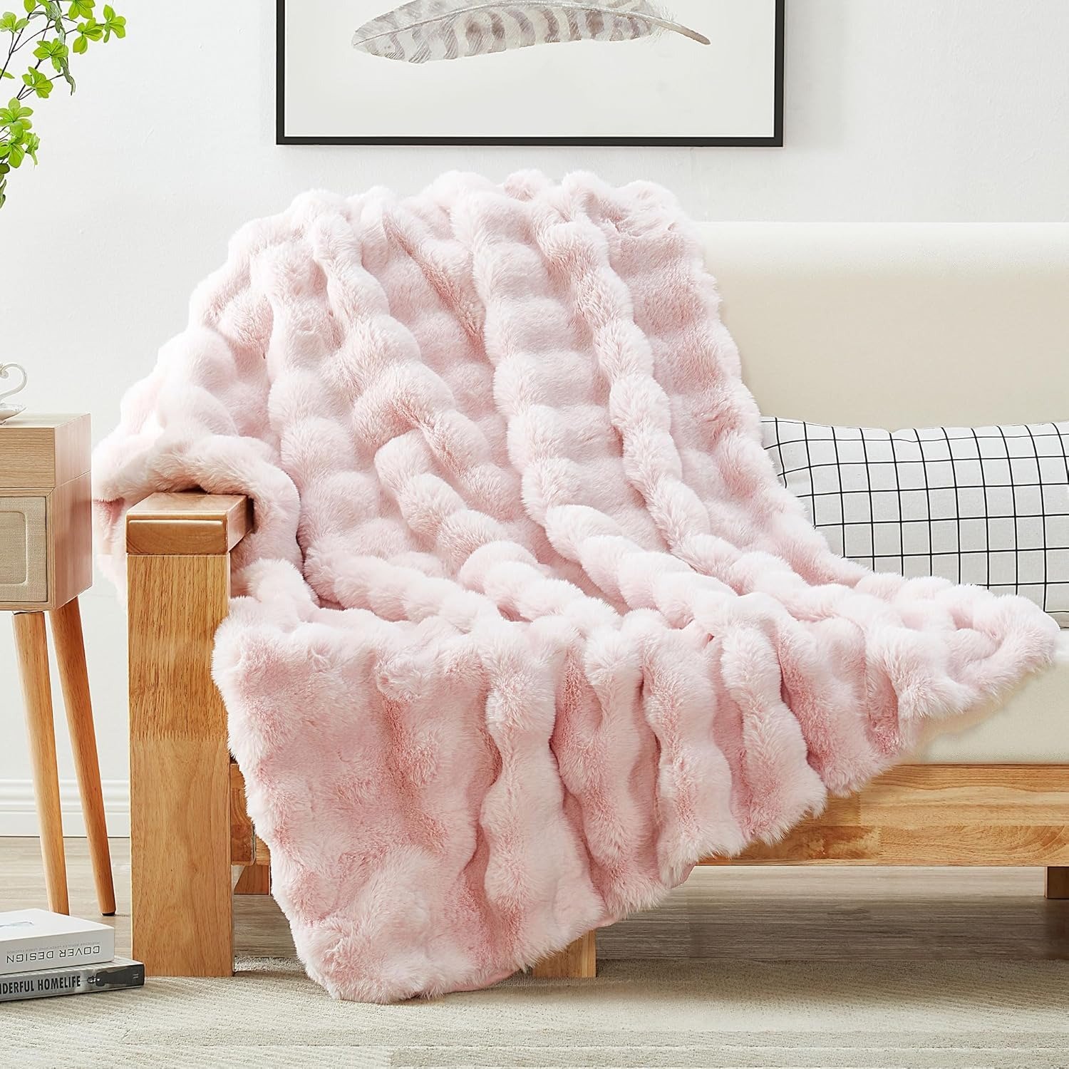 faux rabbit fur throw blanket in multiple colors on couch