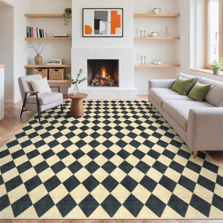 Washable black and cream geometric rug in a bright living room with sofa, fireplace, and open shelving